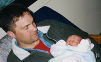 Curt and newborn Sadye, April 2003.